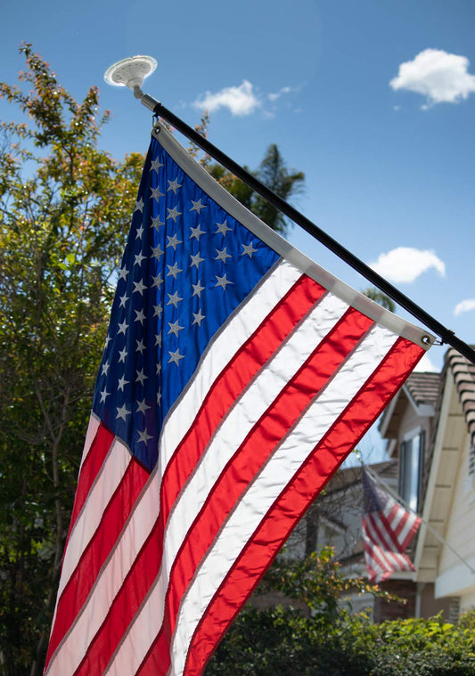 2.5 x 4 ft American Flag Made in USA - Embroidered Stars and Sewn Stripes with Brass Grommets - Fade Resistant Heavy Duty Nylon Indoor Outdoor Flag