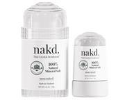 Two nakd deodorant sticks on a white background